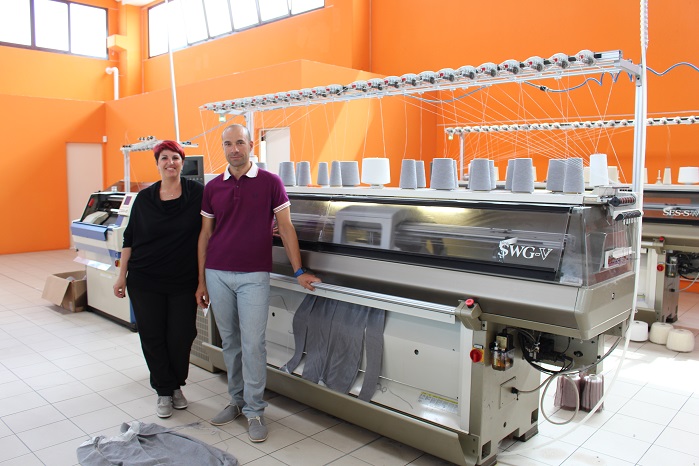 Francesca and Andrea Pasquini in La Trama’s light and airy knitting hall.