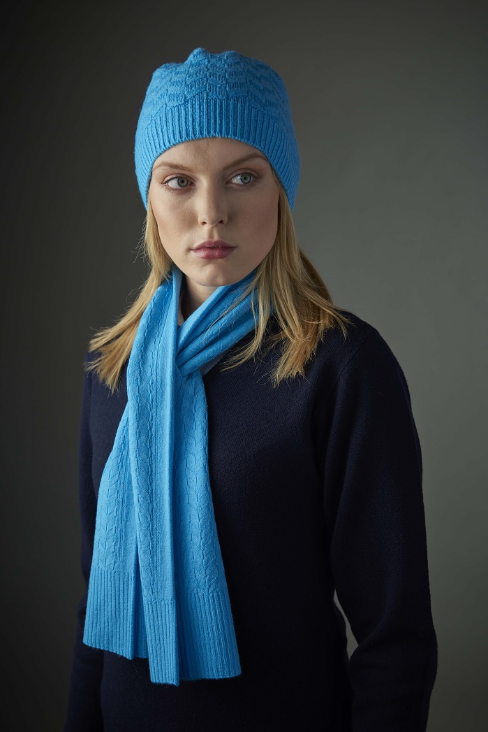A new line of accessories includes hand finished scarves, hats and snoods available in a vibrant array of colours. © Glenbrae
