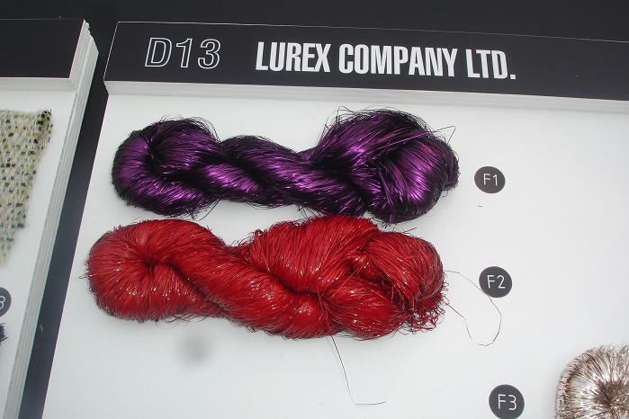 The Lurex Company showed matt effect yarns, holographic and fluorescent deep copper looks, purple and reds, as well as iridescent and transparent yarns. © Janet Prescott 