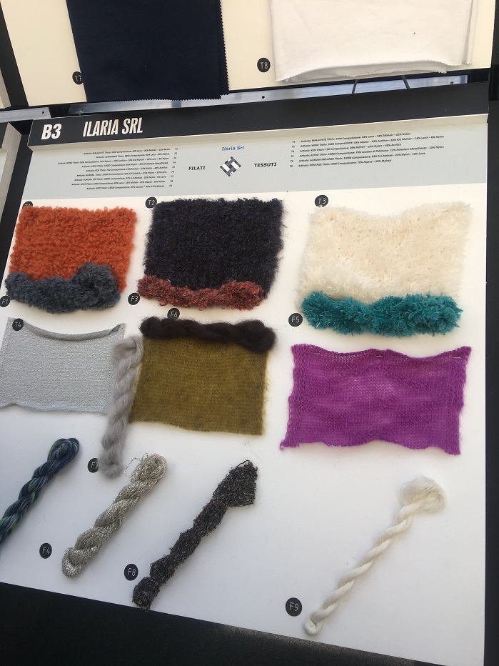 Colourful accents gave a new look to the dark tones in fabrics which were knitted up or woven into samples from the yarns on show. © Janet Prescott
