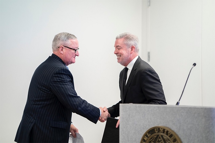 Mayor Jim Kenney shakes hands with President Fry as he is introduced for his speech. © Drexel University