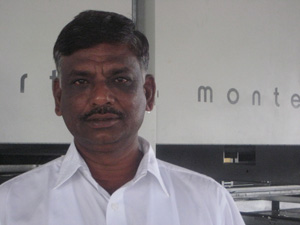 Mr. R. Loganathan of Sri Gayathri Colours beside the Montex 6500 stenter