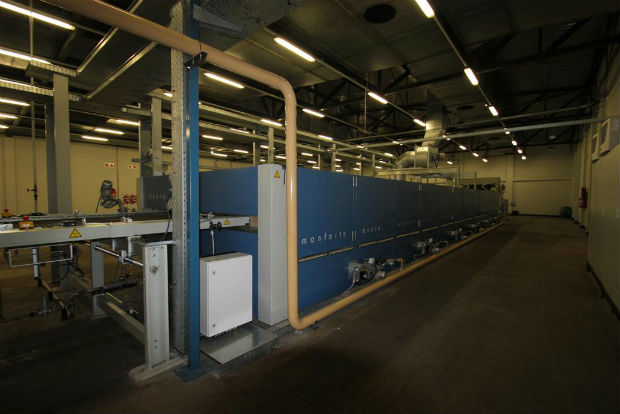 The stenter has been installed in a building purposely set aside for the new unit, together with a flame lamination line. © Monforts 