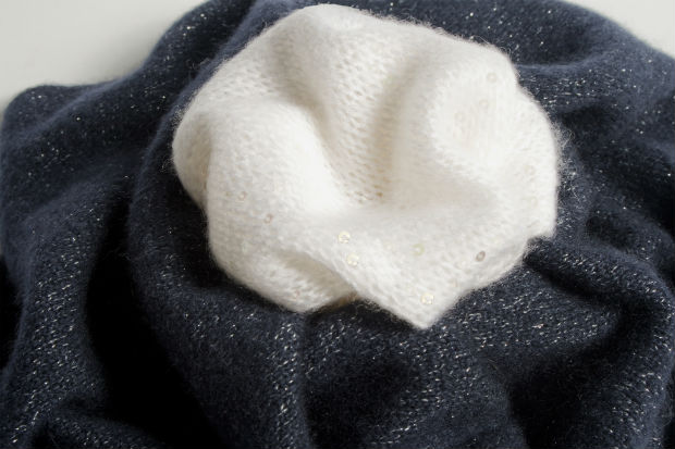 BouclÃ©, 93% cashmere, 7% silk, the Persian-effect cashmere bouclÃ© yarn debuted in a two-colour version for Autumn/Winter 13-14. © Cariaggi