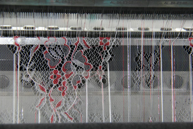 The free-standing, decorative, floral motifs were produced with floating pattern yarns, which were cut open and shorn in a subsequent process. © Karl Mayer 