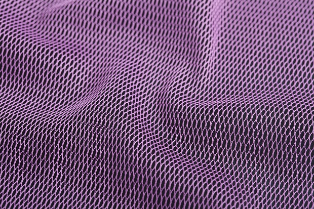 Alternating pattern segments in a 3-stitch hexagonal tulle. © Karl Mayer