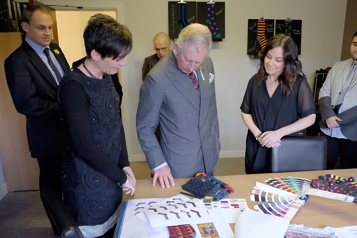 Prince Charles is being shown around the design studio. © Dimitris Legakis/REX 