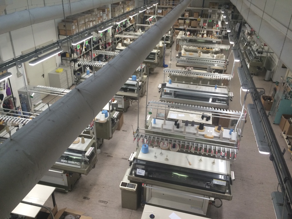 Shima Seiki machines busy sampling at IMAX. Although IMAX physically looks and feels like a factory, it is very much a development and sampling unit.