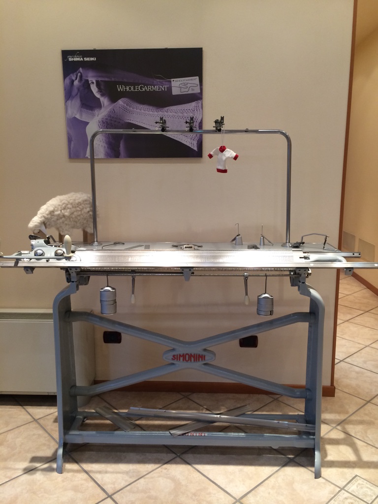 Simonini hand flat knitting machine which Mauro Zanni learned to knit on. When Mauro was a young boy his mother taught him to use the machine and as he grew, he would knit and she would link garments.