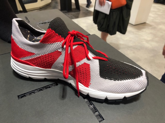 At ITMA 2019 Santoni showed its latest Argyle shoe upper machines. The XT Machine has true transfer stitch capability (no run holes) and can knit selected terry in the same course. © Knitting Industry.
