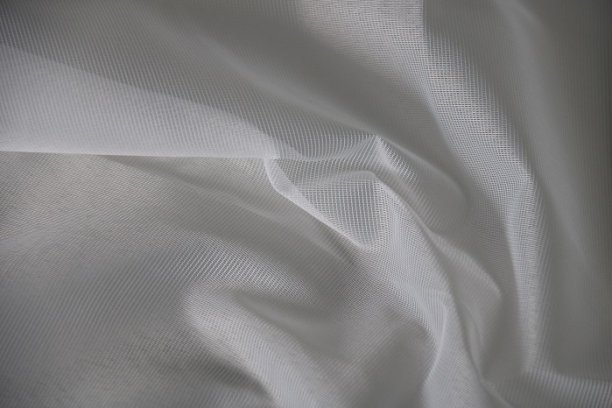 Embroidery ground with a uniform pattern produced on the TM Weft. © Karl Mayer