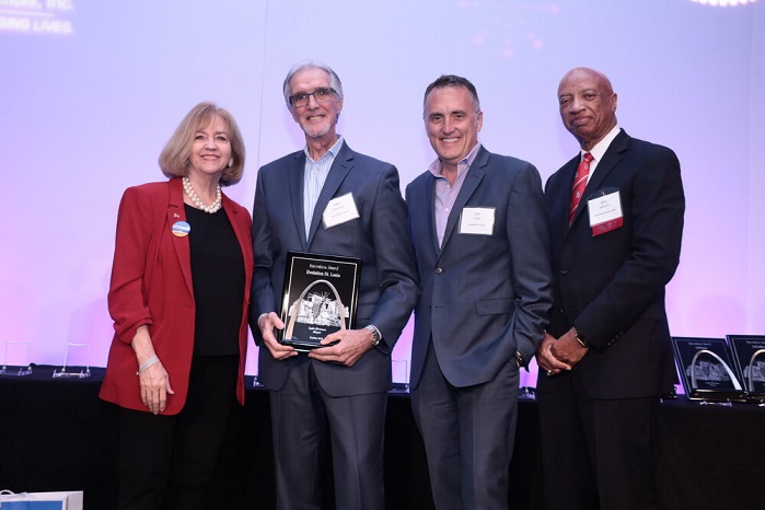 Mayor Lyda Krewson, Evolution St. Louis co-founders John Elmuccio and Jon Lewis, and Otis Williams, Executive Director of the St. Louis Development Corporation. © Maurice Meredith