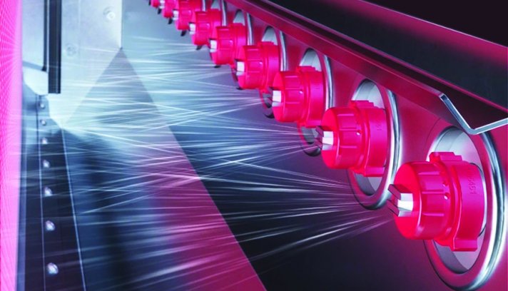 The TexCoat system uses precision spray technology instead of padding or soaking/bath methods to evenly apply finishing chemicals. © Baldwin.