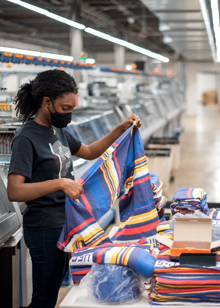 The company also offers full-package services, including raw material sourcing, merchandising, technical design and product engineering. Linking, sewing, finishing, and on-site inventory, logistics, packing and shipping are available. © Evolution St. Louis.