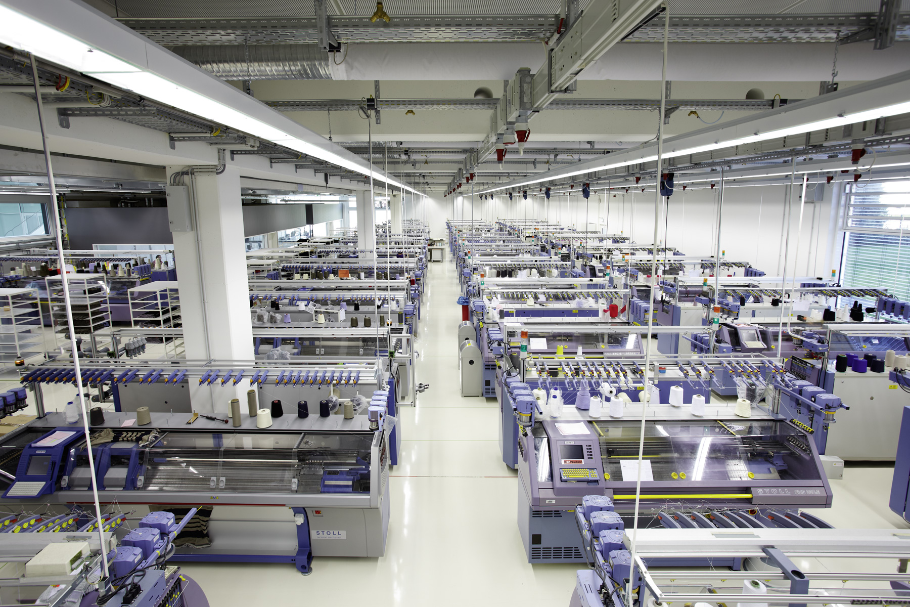 Stoll flat knitting machines produce knitwear in Bodelshausen. © Marc Cain