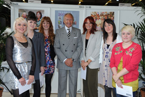 Harold Tillman with the six Texprint prize winners Lisa Stannard, Hollie Maloney, Nancy Taplin, Martha Steadman, Nicola Strathearn and Ruth Davis