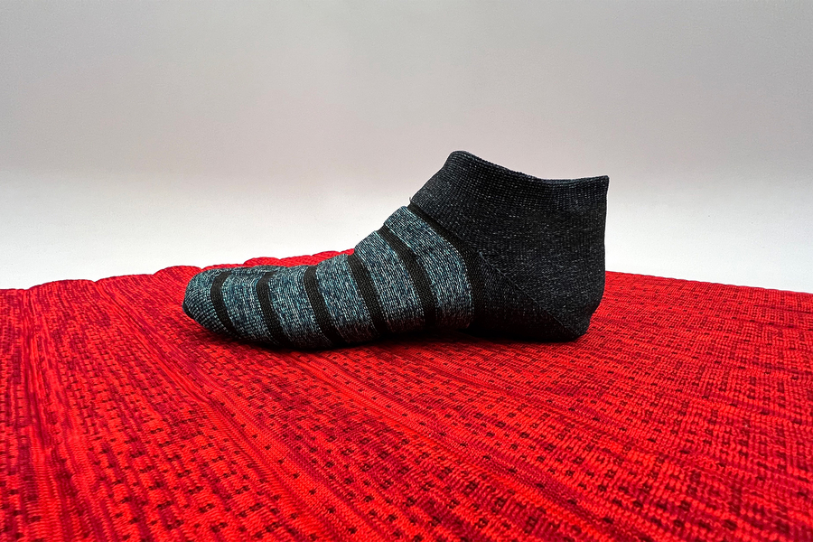Using a novel fabrication process, MIT researchers have produced smart textiles that snugly conform to the body so they can sense the wearer’s posture and motions. © Irmandy Wicaksono | MIT
