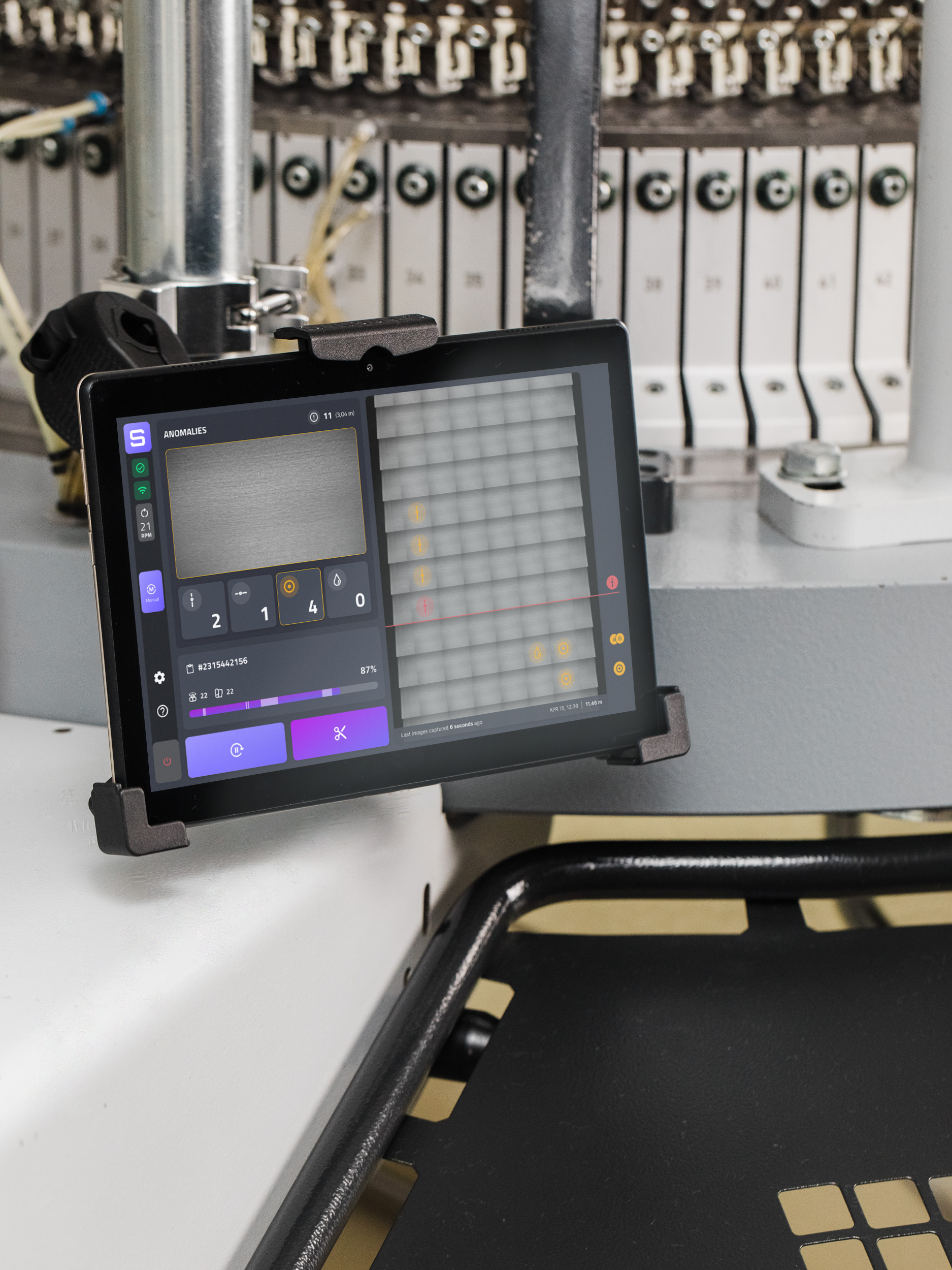 Smartex tablet showcasing real time textile production within a factory. © Smartex