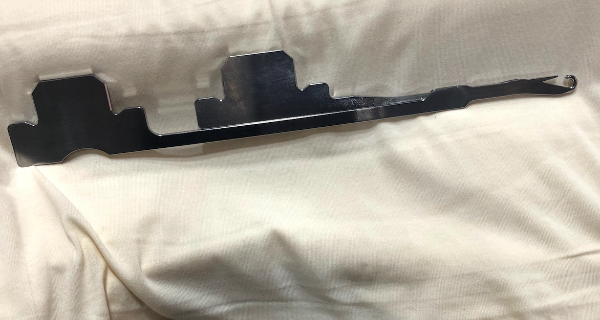 Compound needle with closing sliding latch. © Vanguard Pailung