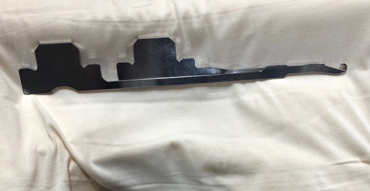 Compound needle with open sliding latch. © Vanguard Pailung