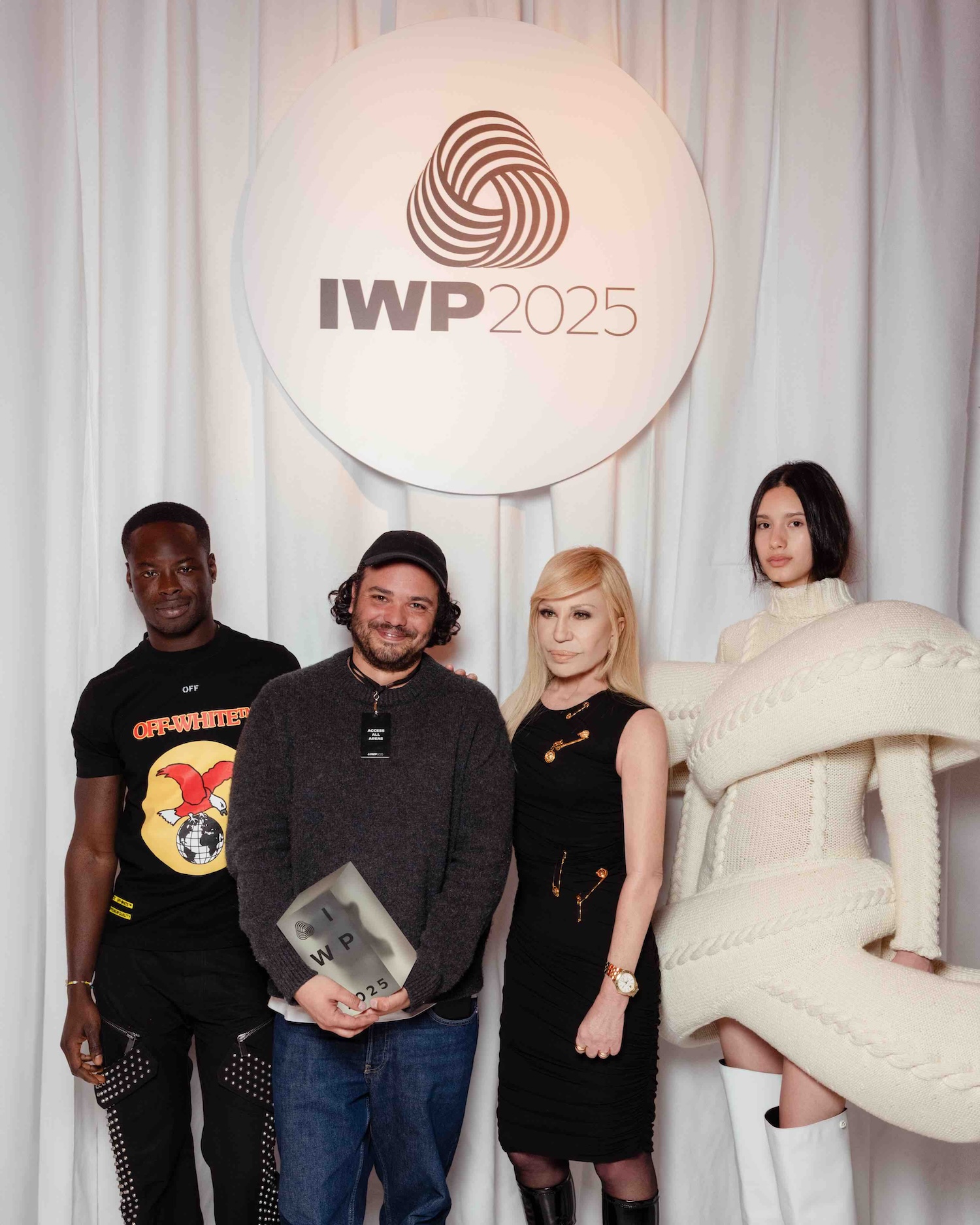 Duran Lantink with IWP judge Donatella Versace. © Woolmark