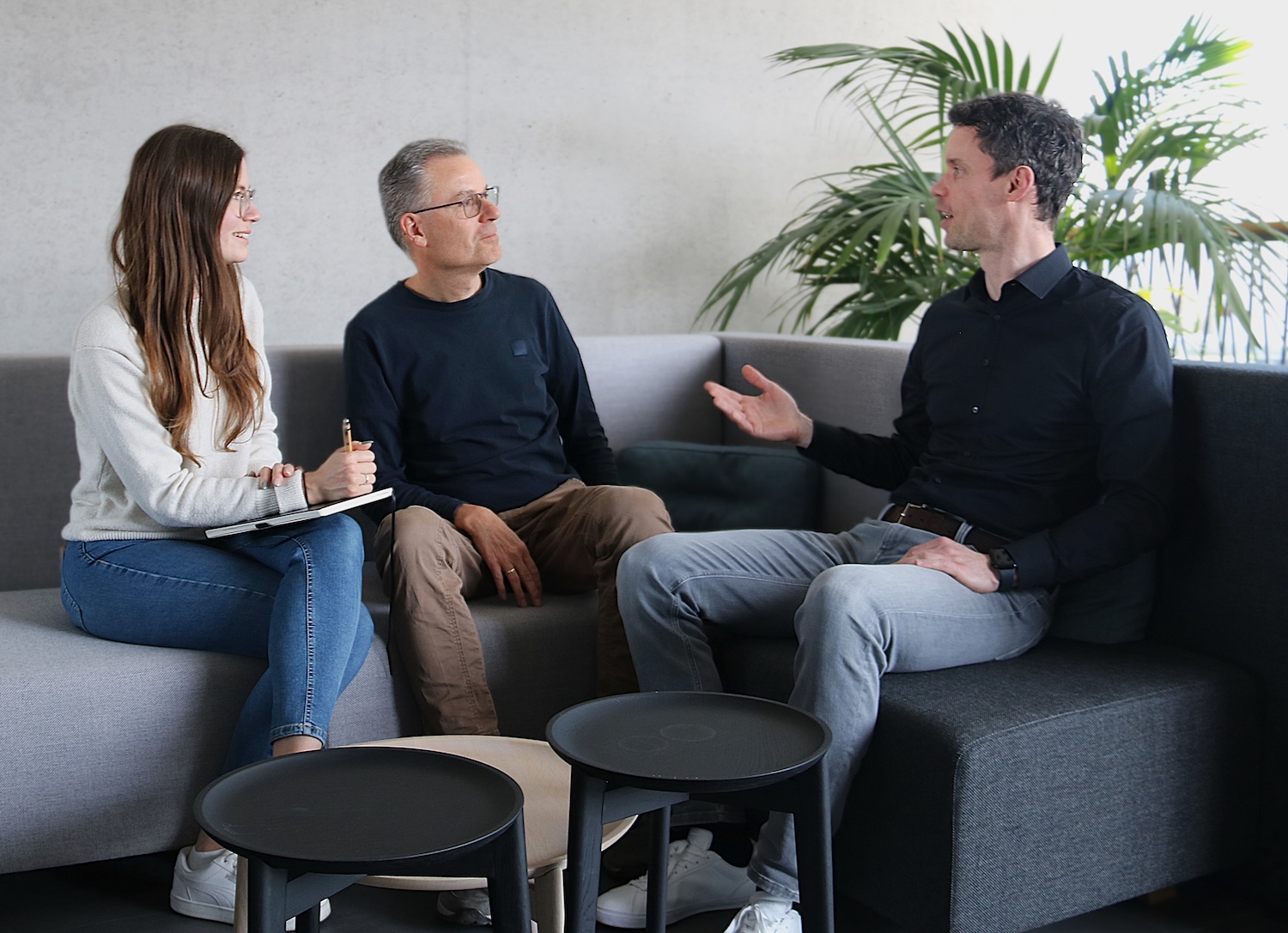 Larissa Ruhmann from the Corporate Communications team at Karl Mayer with Mario Görner, who played a key role in the work on KAMCOS 1 in the early 2000s, and Dr Philipp Erler, Head of Control Platform at Karl Mayer's Warp Knitting business unit.
