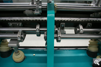 The shaft, divided into segments, for driving the bars