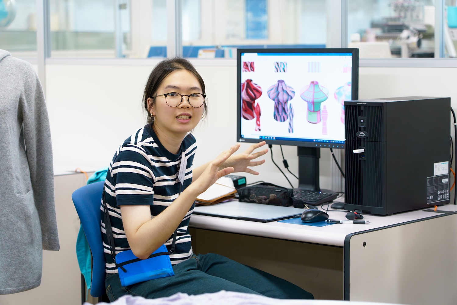 Jingwen Liao, an MA student at the Royal College of Art, training at Shima Seiki headquarters. © Shima Seiki